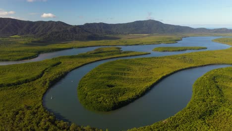 Aerial-view-flying-over-rainforest-river-landscape