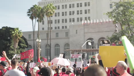 LAUSD-Teacher's-Strike-Action-in-Front-of-City-Hall-with-Palm-Trees,-Signs