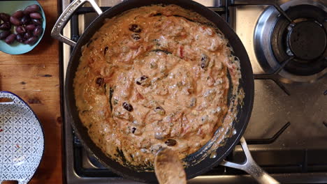 Overhead-Timelapse-of-cooking-Italian-dish-in-frying-pan
