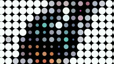 Motion-graphics-of-right-moving-footage-of-blinking-small-colorful-circles-arranged-in-rows