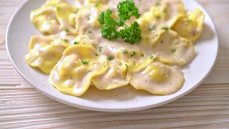 ravioli-pasta-with-mushroom-cream-sauce-and-cheese---Italian-food-style