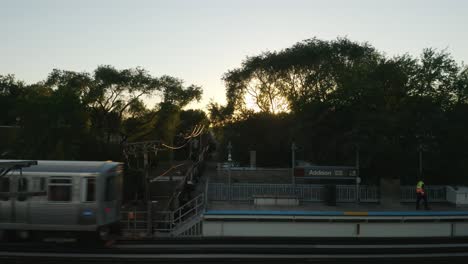 Day-Time-Exterior-Establishing-Shot,-CTA-Subway-L-Train-Passes-by-on-Tracks