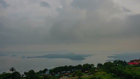 Time-lapse-of-clouds-clearing-to-reveal-Taal-Volcano-caldera-in-Philippines