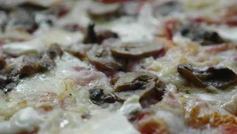 Close-up-shot-of-delicious,-mouth-watering-ingredients-on-a-authentic-Italian-pizza