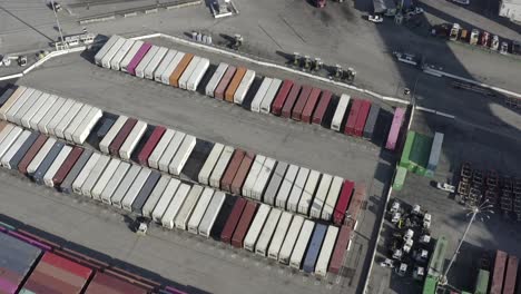 Aerial-view,-Long-Beach-shipping-containers,-cargo-of-international-products-at-terminal