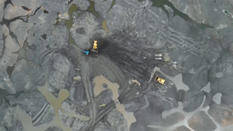 Drone-view-of-Workers-Mining-on-The-Pitch-Lake-in-Trinidad-from-above