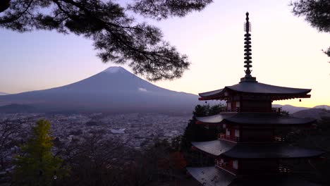 Famous-Chureito-Pagoda-landmark-in-Japan-with-Mount-Fuji-at-sunset---static-shot