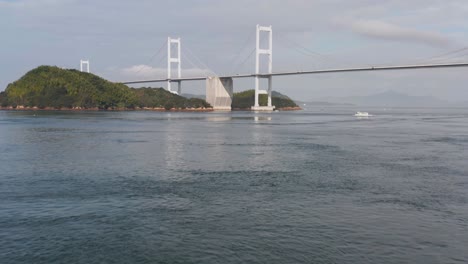 4k-Flying-forward-to-reveal-Kurushima-Kaikyo-Bridge,-Japan