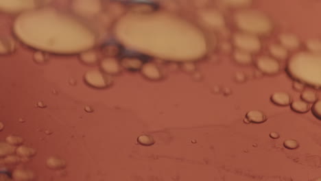 Microscopic-bubbles-moving-in-viscous-amber-liquid