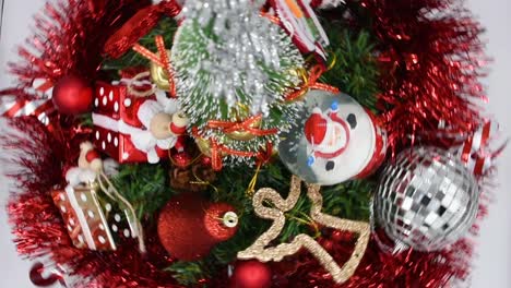 Top-view-of-cheerful-Christmas-decorations-spinning