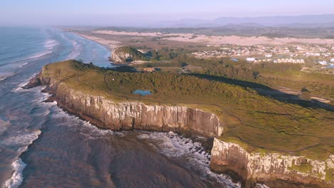 Cinematic-aerial-view-of-high-Cliffs-on-atlantic-ocean,-Guarita-Park,-Brazilian-Conservation-Unit-located-in-the-southern-region,-State-of-Rio-Grande-do-Sul,-Torres-City