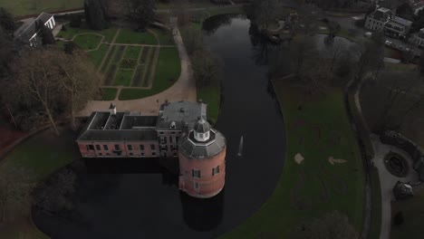 Moated-castle-with-landscaped-garden-at-Rosendael-stronghold-with-enforced-tower-revealing-the-blueprint-from-a-top-down-view