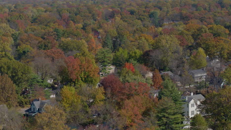 Beautiful-aerial-view-of-Clayton-city-skyline-from-Kirkwood-Missouri-in-the-Fall-with-a-tilt-down-to-houses