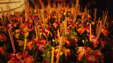 Closeup-of-beautiful-Loy-Krothong-flowers-in-baskets-on-the-stand-for-sale-on-the-night-market-for-the-Loy-Krathong-Festival-in-Bangkok,-Thailand,-Asia