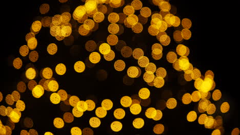 Blurred-blinking-lights-on-Christmas-tree.-Bokeh-effect