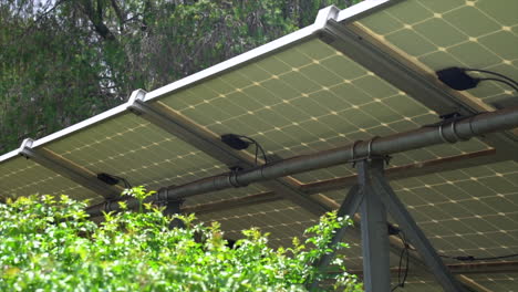 Back-of-solar-panels,-panning-full-shot-right-to-left