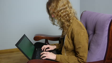 Work-from-home,-young-woman-typing-on-laptop-keyboard,-e-learning-concept