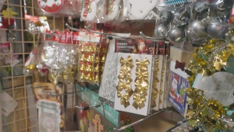 Christmas-Decors-Displayed-For-Sale-In-A-Store---close-up,-tilt-down-shot