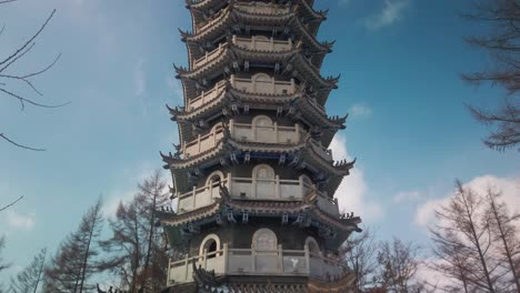 Tilting-up-shot-of-a-Chinese-pagoda-during-the-winter