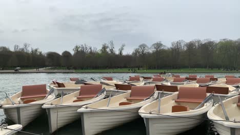 Different-views-of-the-bobbing-boats-on-the-Fountains-of-Versailles,-next-to-the-Palace-of-Versailles