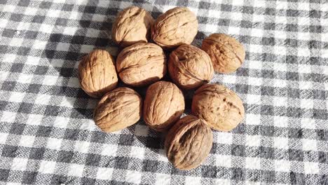 Walnuts-on-the-Table-pan-view-Stock-Video