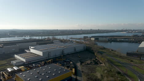 High-angle-Pan-over-vast-industrial-area-with-large-river