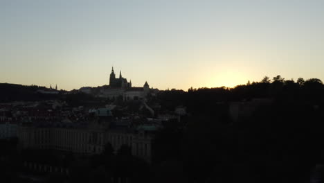 Aerial-shot-of-Prague-Castle-and-skyline-silhouette-at-dusk