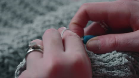 Woman-Crochets-A-Product-From-Soft-Gray-Yarn---Crochet-Process---close-up