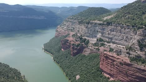 Aerial-views-of-Tavertet-cliffs-in-Catalonia-and-Sau-lake