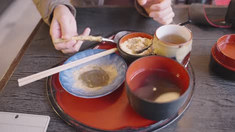 Hot-Warabi-Mochi,-covered-in-roasted-soybean-Kinako-Flour