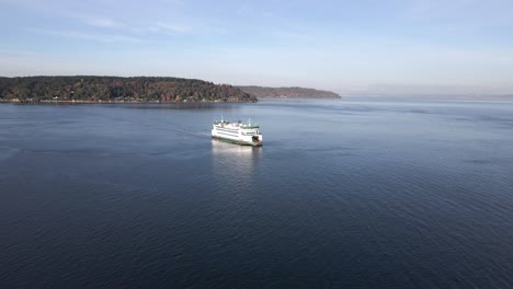 The-Vashon-Ferry-approaches-Point-Defiance-terminal,-calm-blue-water,-aerial