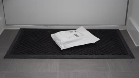 Parcel-laying-on-doormat-after-delivery