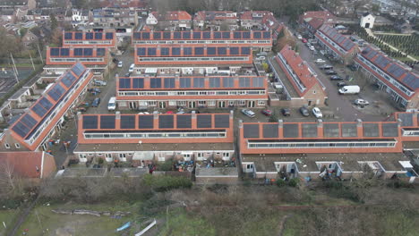 Jib-up-of-suburban-neighborhood-with-solar-panels-on-rooftops