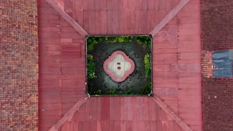 Courtyard-in-center-of-Resident-House-in-Magelang,-roof-aerial-top-view
