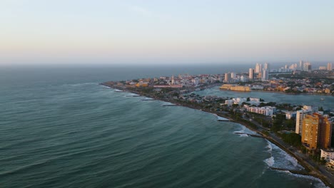 Aerial-View-of-Cartagena's-Old-Town-in-the-Distance-at-Sunset