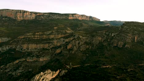 rocky-hill-of-Catalonia--Spain,-green-rocky-hills-in-Spain,-drone-view-of-the-rocky-mountain-in-Spain