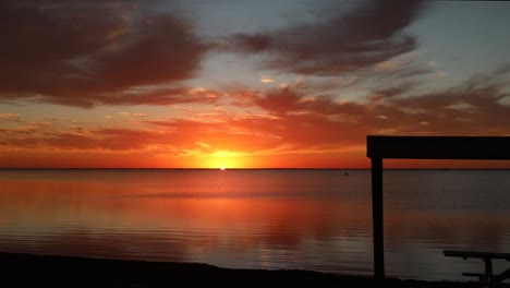 Glorious-sunset-over-a-calm-Laguna-Madres-estuary-at-North-Padre-Island-National-Seashore-along-Gulf-Coast-of-Texas