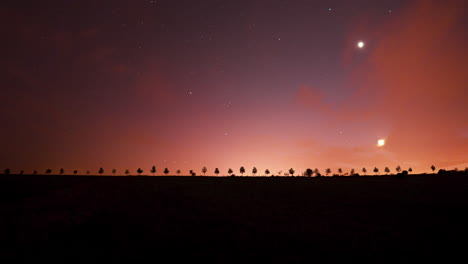 Cosmic-timelapse-with-stars,-comets,-the-Moon,-planet-Venus,-and-the-Starlink-satelites-flying-by