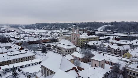 Descending-aerial-shot-of-Kaunas-Old-Town-during-winter-season
