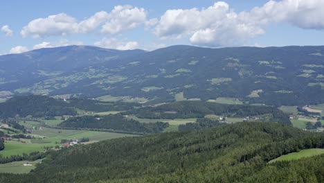 Aerial-view-of-a-valley-with-the-small-village-at-Lavamünd-Austria