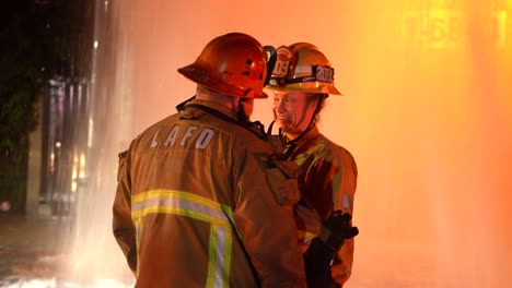 Firefighters-talking-on-scene-of-incident