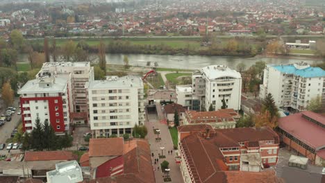 Serbian-Kraljevo-city-centre-buildings-and-streets,-aerial-view