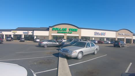 Store-fronts-of-a-small-shopping-plaza---Dollar-Tree,-Once-Upon-a-Child,-and-Plato's-Closet