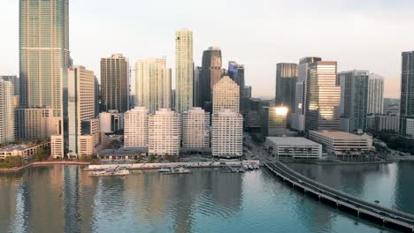 Downtown-Miami-skyline-from-drone-at-sunrise,-view-from-Brickell-Key