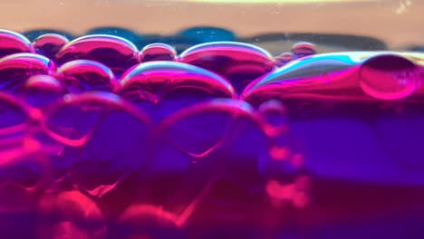 Pretty-pink-and-blue-bubbles-floating-and-dropping