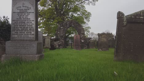 Close-up-shots-of-old-tombstones-in-Stirling-on-a-rainy-day