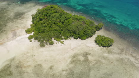 Aerial-showing-a-Island-in-the-shape-of-a-heart-on-Siargao-Island,-Philippines