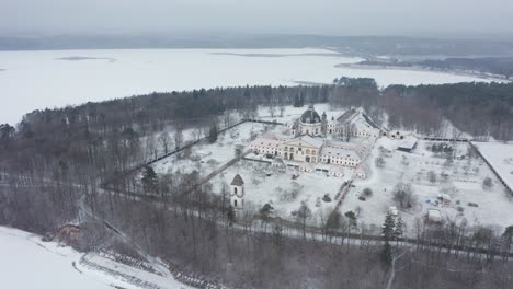 AERIAL:-Rotating-Shot-of-Pažaislis-Monastery-in-Winter-near-Kaunas-Reservoir