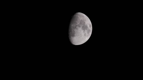Waxing-Gibbous-Three-Quarter-Moon-In-Black-Night-Sky-4K