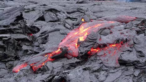 Flowing-liquid-magma-lava,-moving-out-through-molten-rock-crust---static-view